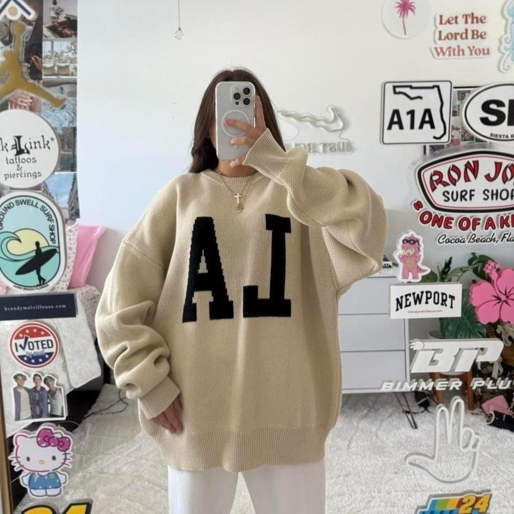 cream and‎ black LA pacsun sweater